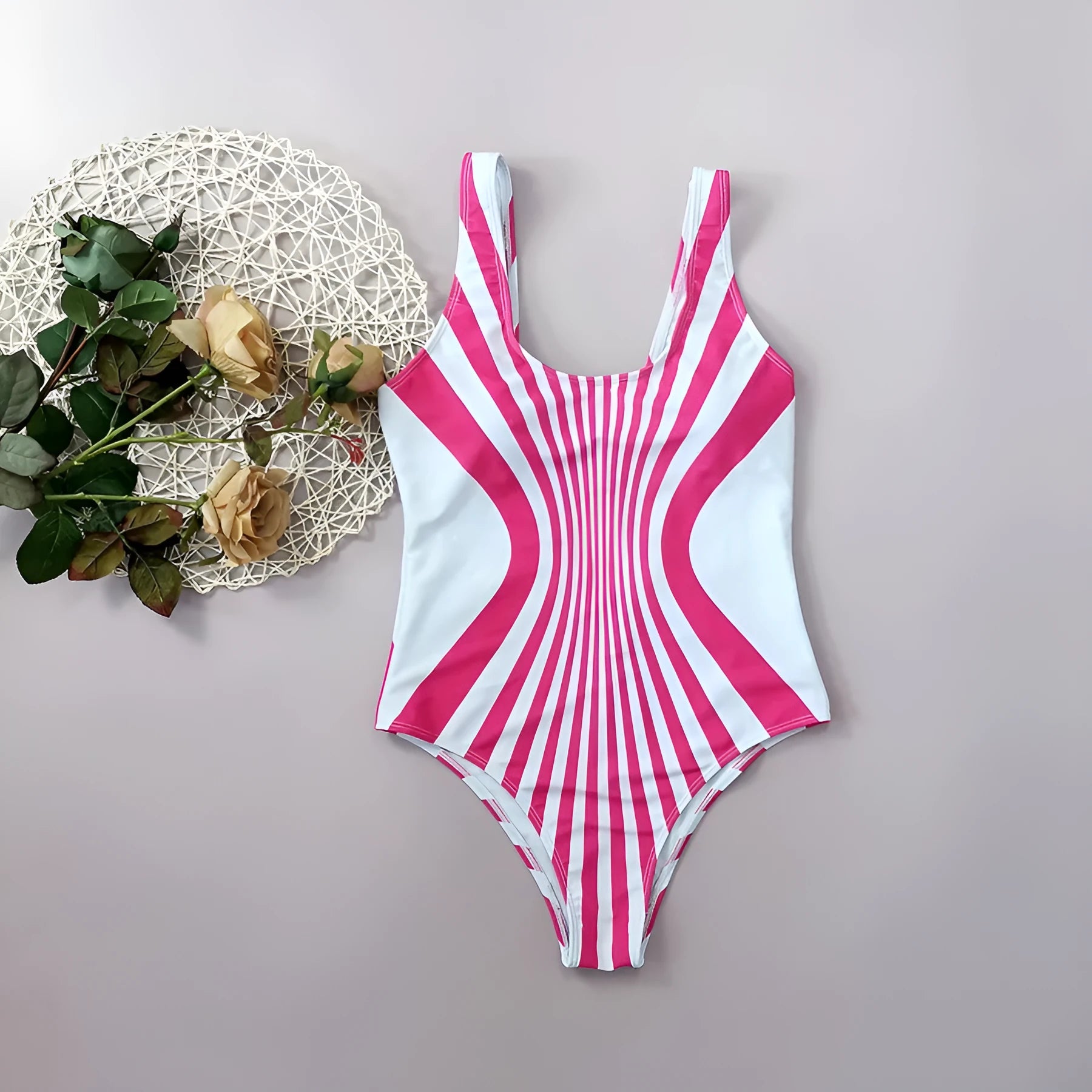 Pink and white striped one-piece swimsuit for women with digital printing on front and back.