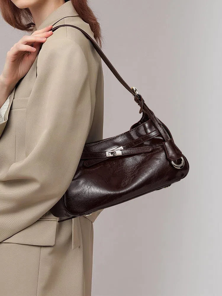 Soft genuine leather horizontal square crossbody bag with stitching detail, available in black, brown, and coffee for daily commuting