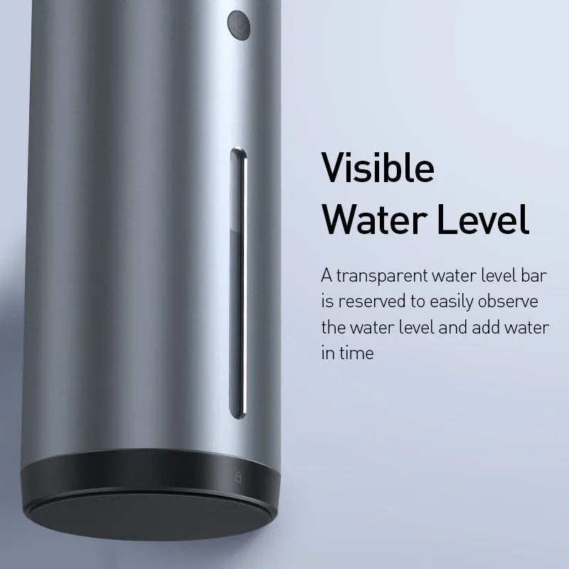 Black aluminium alloy car diffuser humidifier with USB cable on a car dashboard.