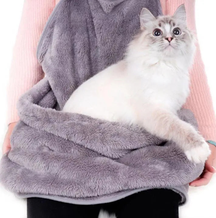 Grey pet carrying bag with sleeping chest apron on a table, showing double-sided arcum material and 70x62 cm size