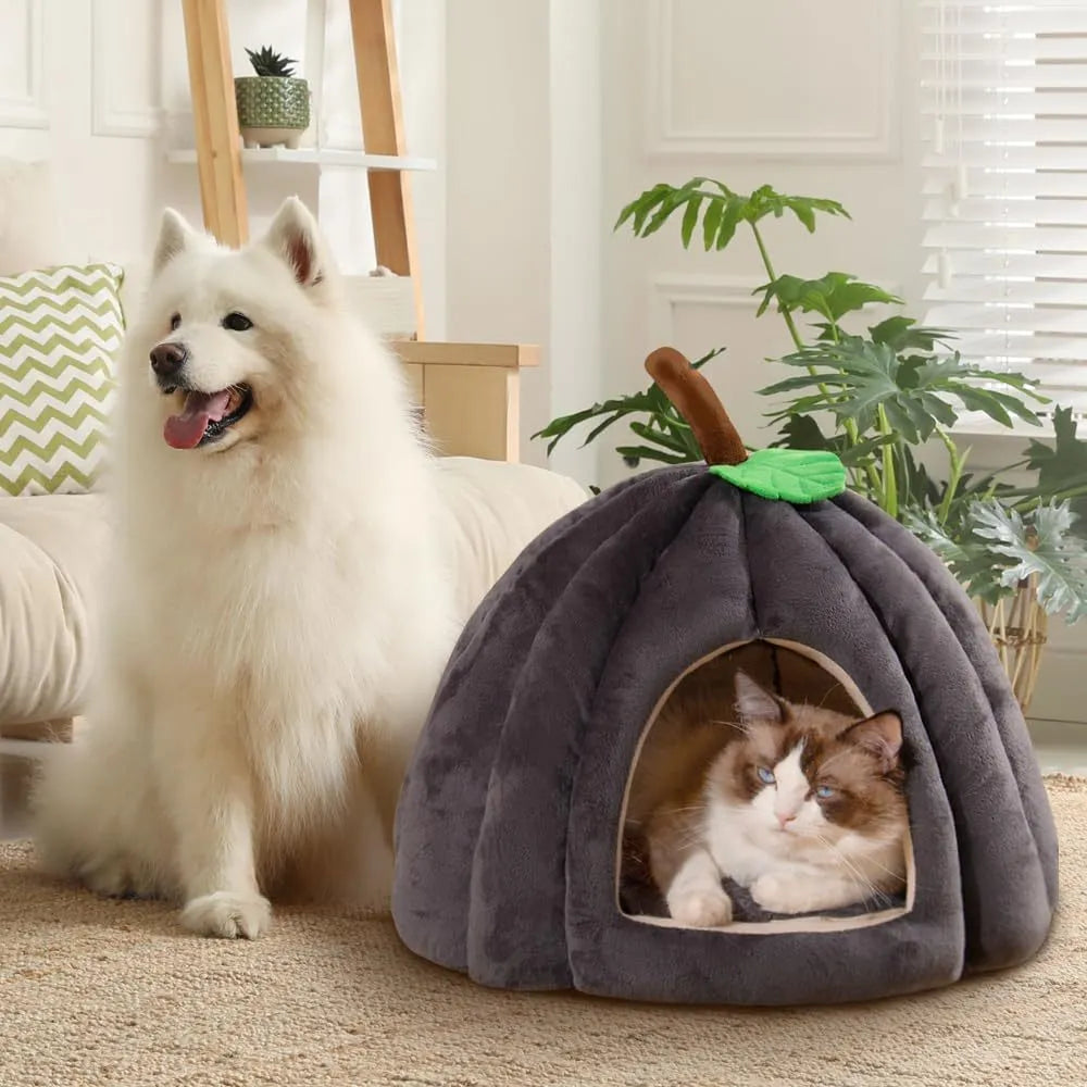 Pumpkin-shaped cat bed in blue, showing semi-enclosed cave design and plush fabric entrance.