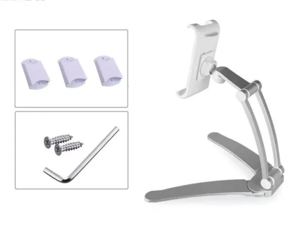 Silver aluminium alloy desktop tablet stand holding a tablet, showing its 360-degree rotation and adjustable chuck mechanism.