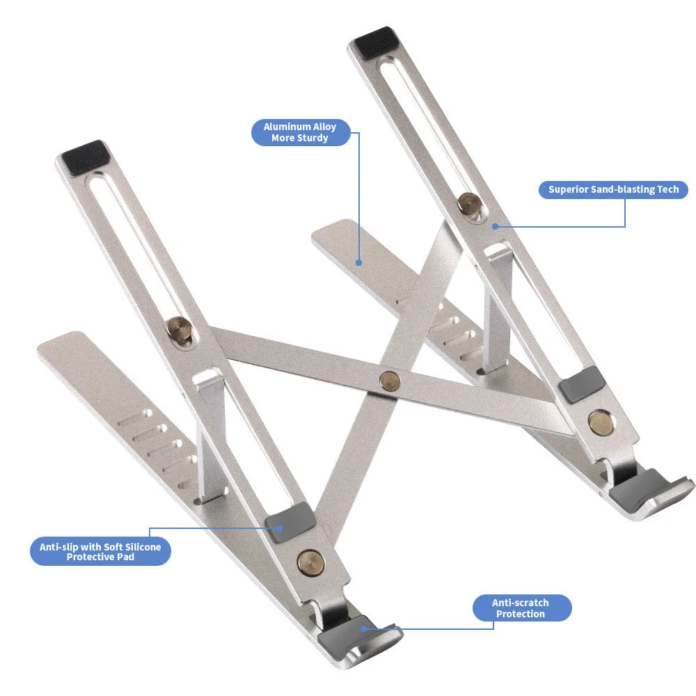 Silver aluminium laptop stand open at an angle next to a closed laptop.