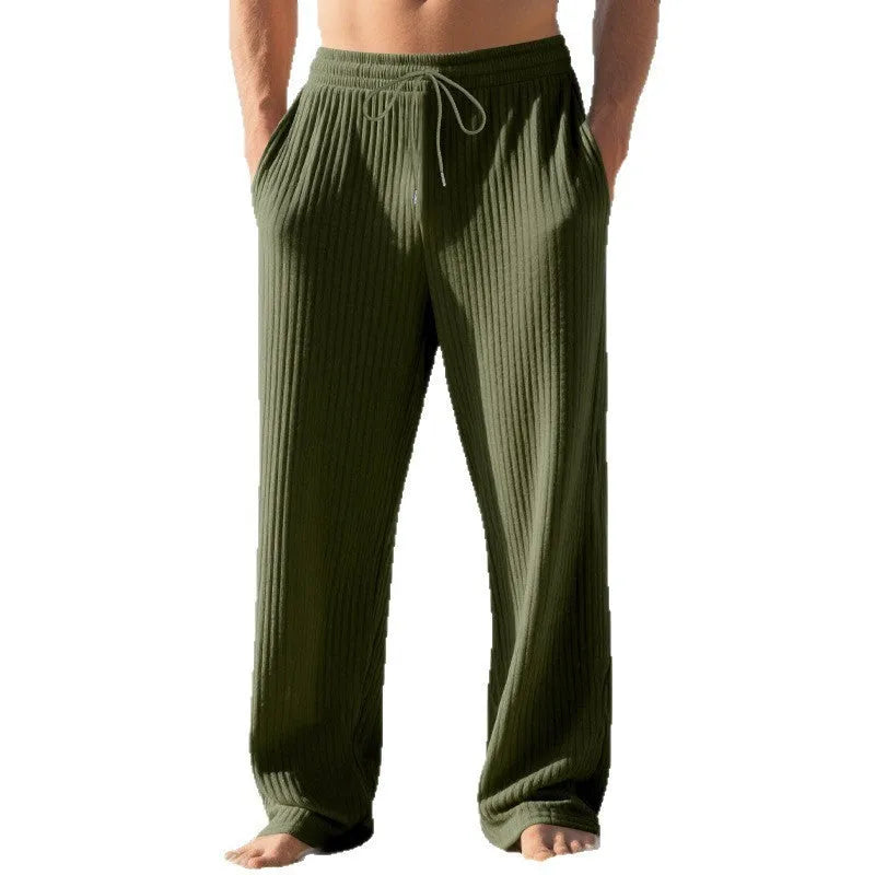 Men's baggy straight trousers in solid colour with drawstring waist, polyester blend fabric, casual style