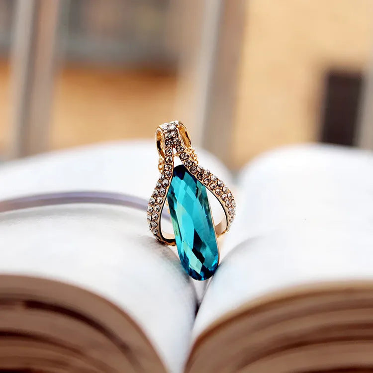 Gold-plated peacock blue earrings and pendant set for women, alloy jewellery with electroplated finish