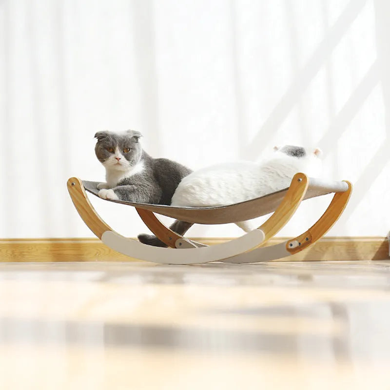 Solid wood cat bed with grey cloth cushion and anti-slip mat base, raised off-ground design