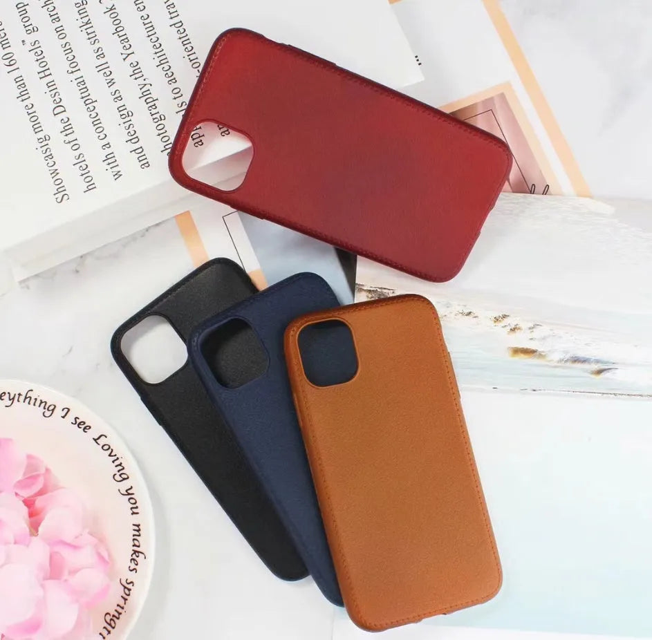 Genuine leather iPhone case with TPU interior in black, brown, navy blue, and wine red colours