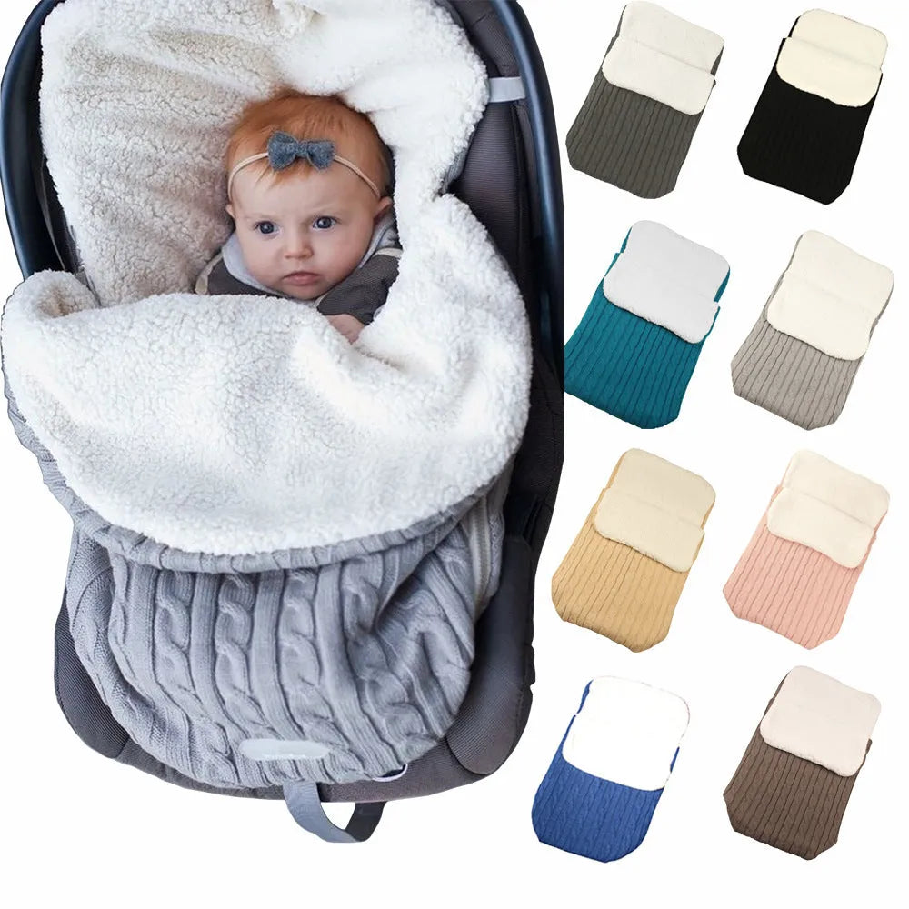 Baby stroller sleeping bag with thick filling shown in beige colour on a pushchair