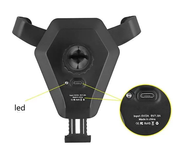 Black car wireless charger magic array with Micro USB input on a car dashboard