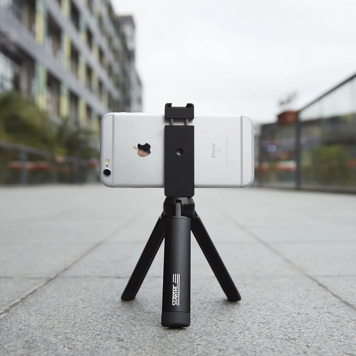 Aluminium smartphone bracket accessory for table top tripod, compatible with Apple iPhone models.