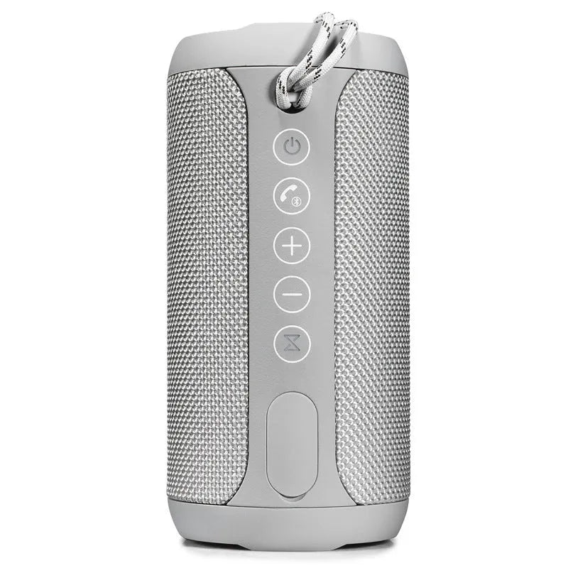 Compact flat waterproof Bluetooth speaker in black, showing its portable card-like design and control buttons.