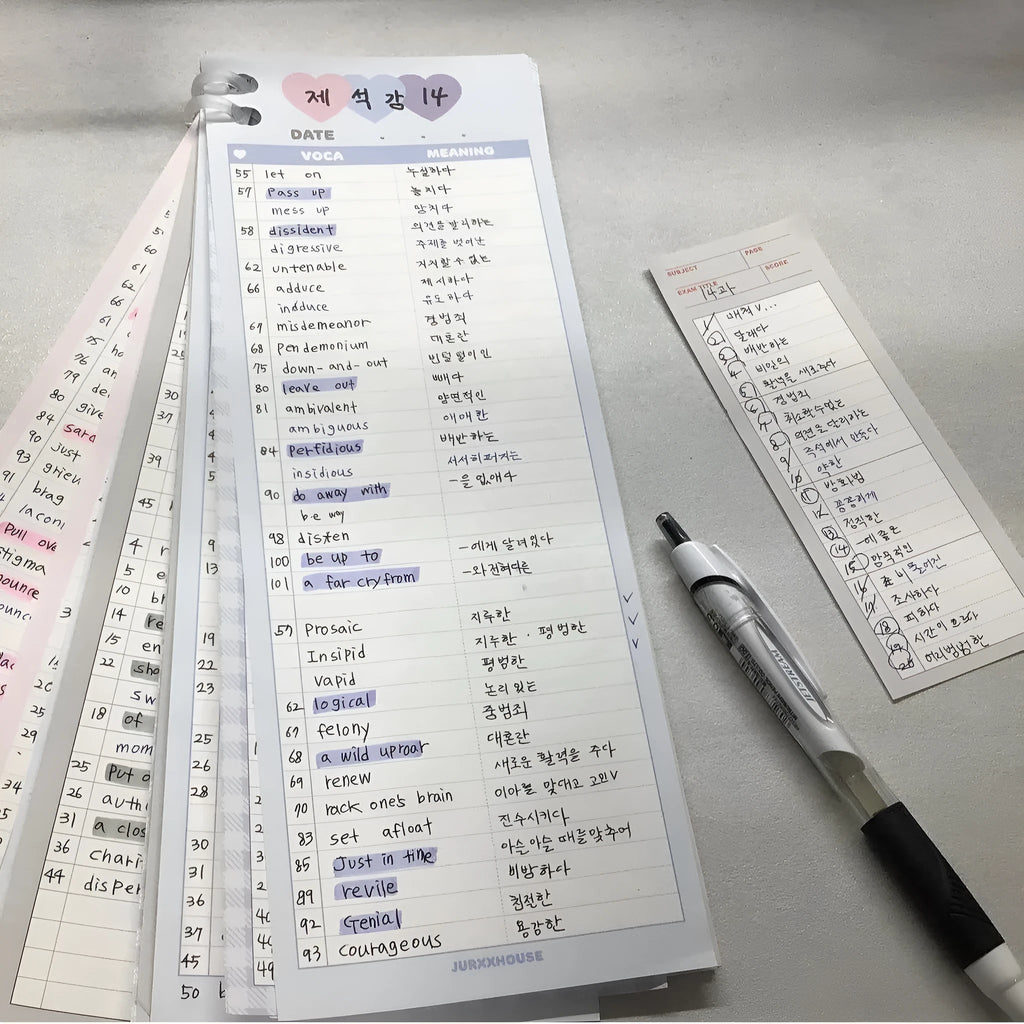 Vertical half-B5 notepad with English words, shown in pink, purple, and blue cover colour options.
