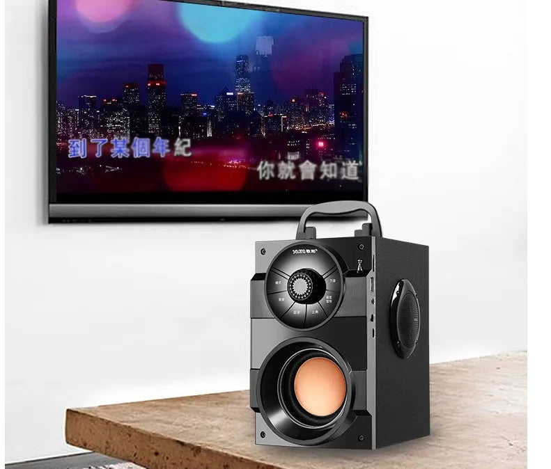 Black portable mini home audio system with subwoofer, USB cable, and 1.2m audio cable.