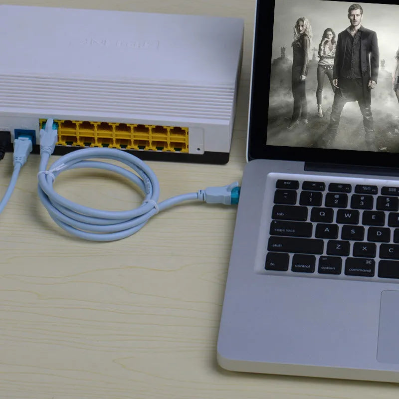 Ice blue Cat5e RJ45 Ethernet jumper cable with gold-plated connectors