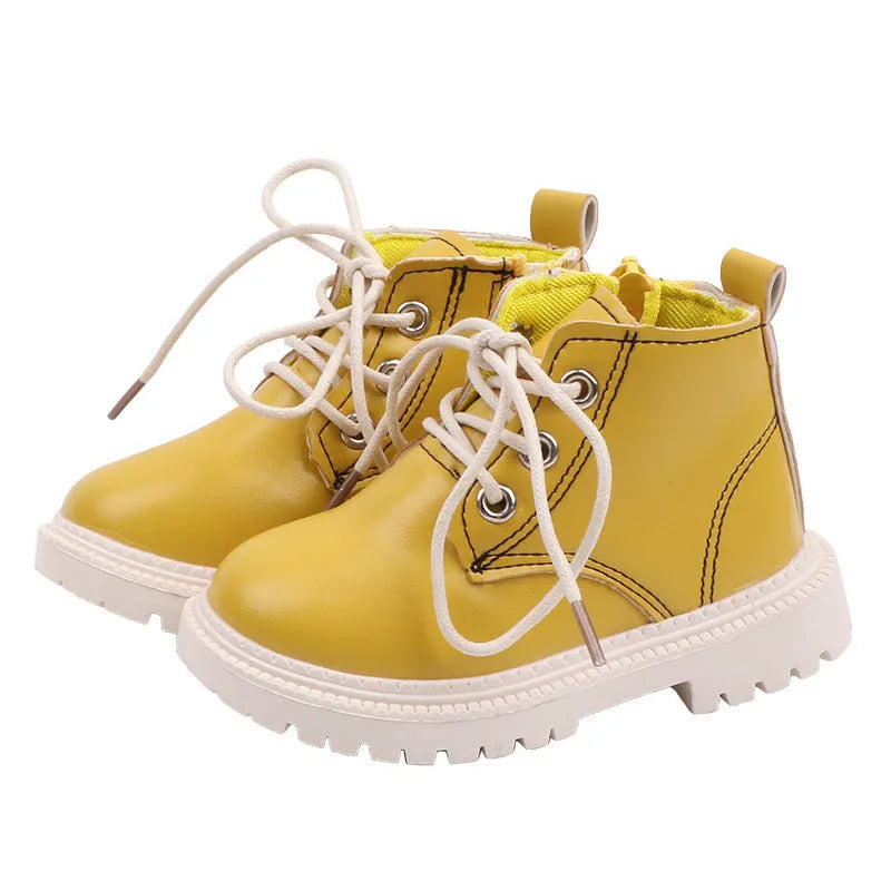 Boys leather short boots with synthetic upper and rubber sole in beige colour, side view