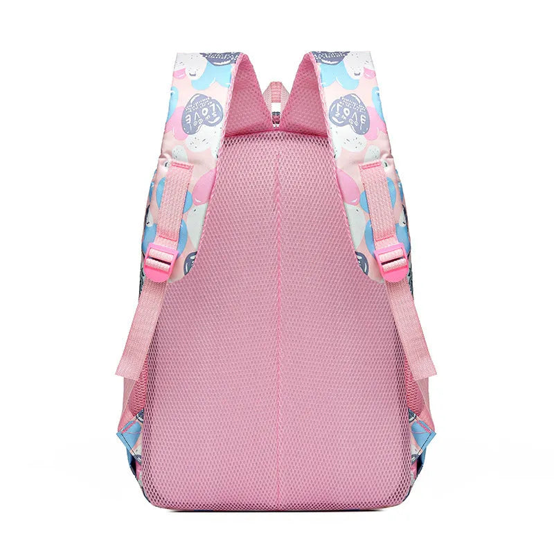 Blue student backpack with air cushion straps on a grey background, showing large main compartment.