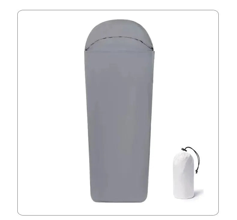 Blue mummy-style camping sleeping bag made from matte nylon fabric, shown rolled and unrolled.