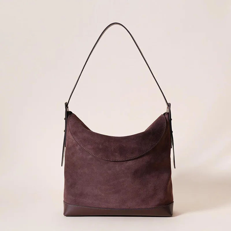 Genuine leather women's shoulder bag in brown with clamshell design and European retro styling