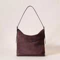 Genuine leather women's shoulder bag in brown with clamshell design and European retro styling