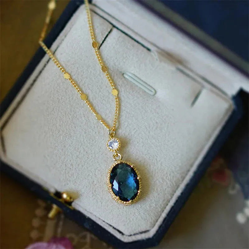 Geometric pendant necklace with a gold electroplated finish on a copper chain, French retro style.