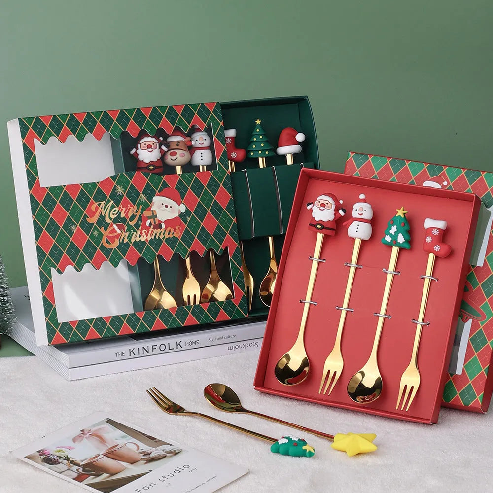 Stainless steel Christmas spoon and fork set with festive handle designs on a red background.