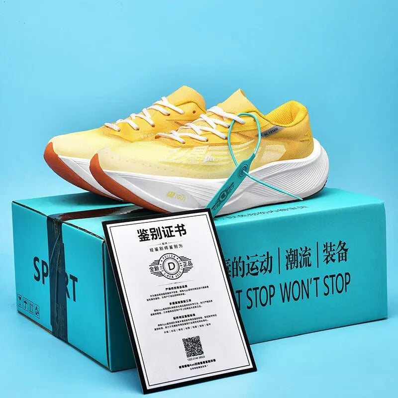 Low-top racing sneaker in glacier colour with lace-up front, carbon plate sole, and natural rubber outsole.