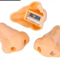 Flesh colour plastic big nostril manual pencil sharpener with geometric shape.