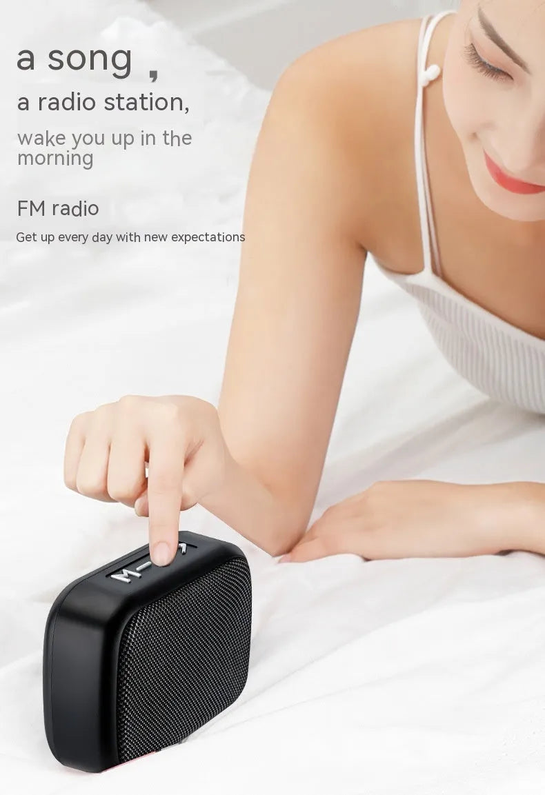 G2 fabric Bluetooth outdoor portable speaker in black with metal grille, side view