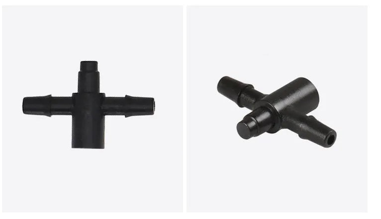 A white plastic tee water distributor joint for micro spray irrigation systems.