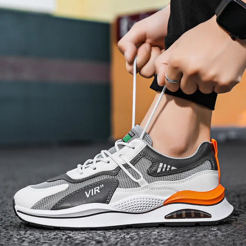 Men's grey mesh running shoes with round toe design and lightweight EVA sole
