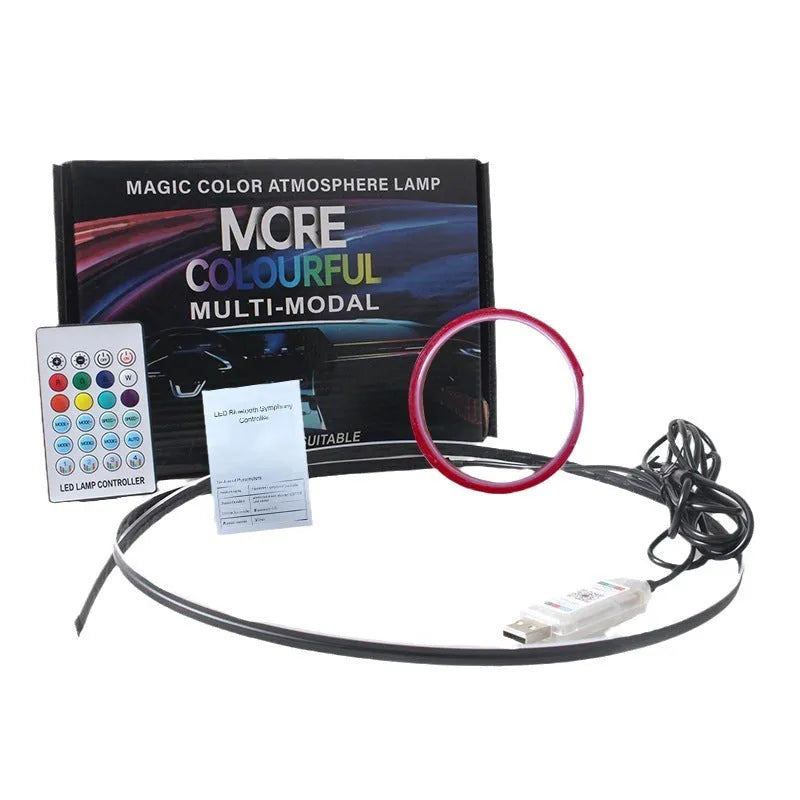 Flexible 110cm USB car interior LED ambience light strip with remote control on a car dashboard