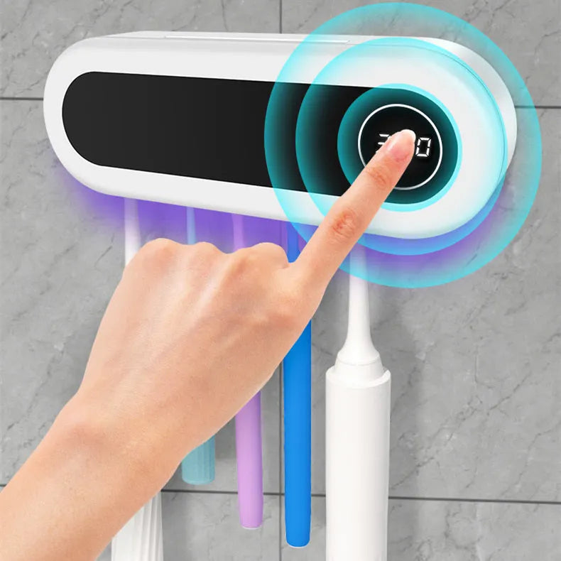 Ivory white wall-mounted UV toothbrush sterilizer holder with digital display showing 360-second timer.