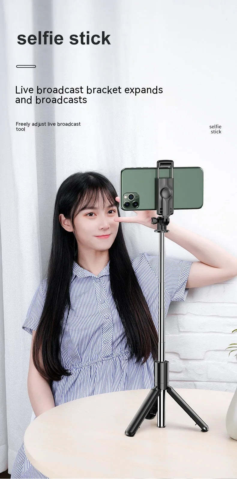 Black selfie stick tripod with wireless Bluetooth remote, universal phone holder, and optional ribbon fill light