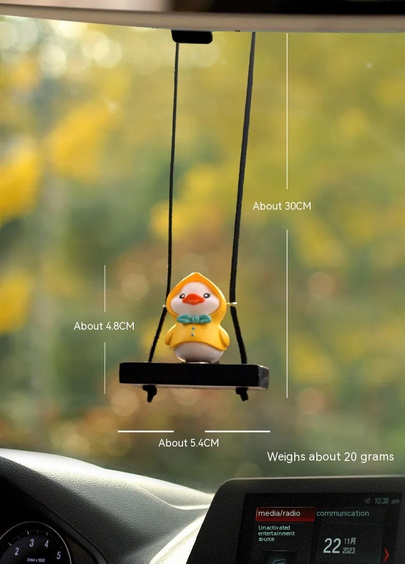 Yellow cartoon duck car hanging ornament in plastic, shown in four style variations.