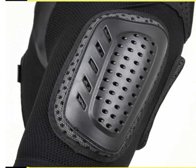 Black cycling protective pants with integrated hip pads, shown in size L for adult mountain bike or BMX use.