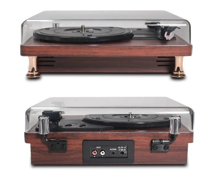 Retro vinyl record player with wood grain finish, transparent dust cover, and built-in speaker