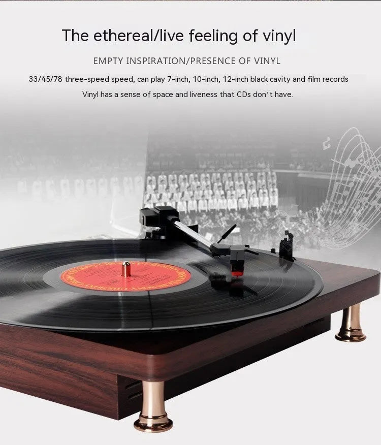 Retro vinyl record player with wood grain finish, transparent dust cover, and built-in speaker