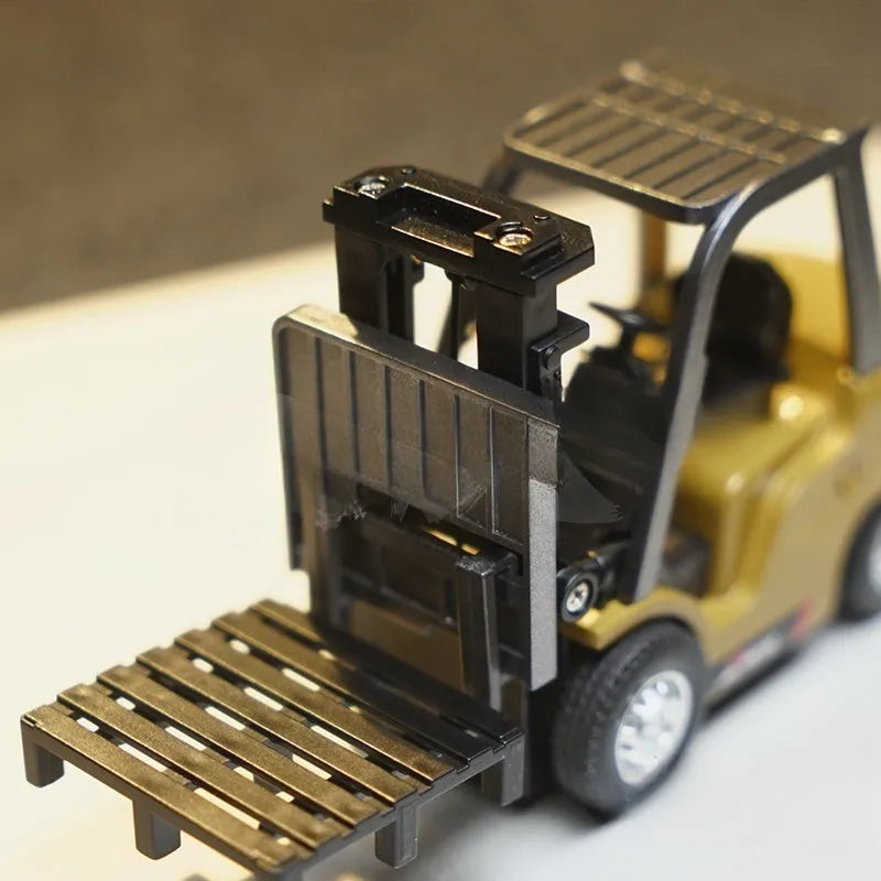 Alloy remote control engineering vehicle toy with mobile phone control, available as forklift, excavator or dumptruck for ages 7 to 14
