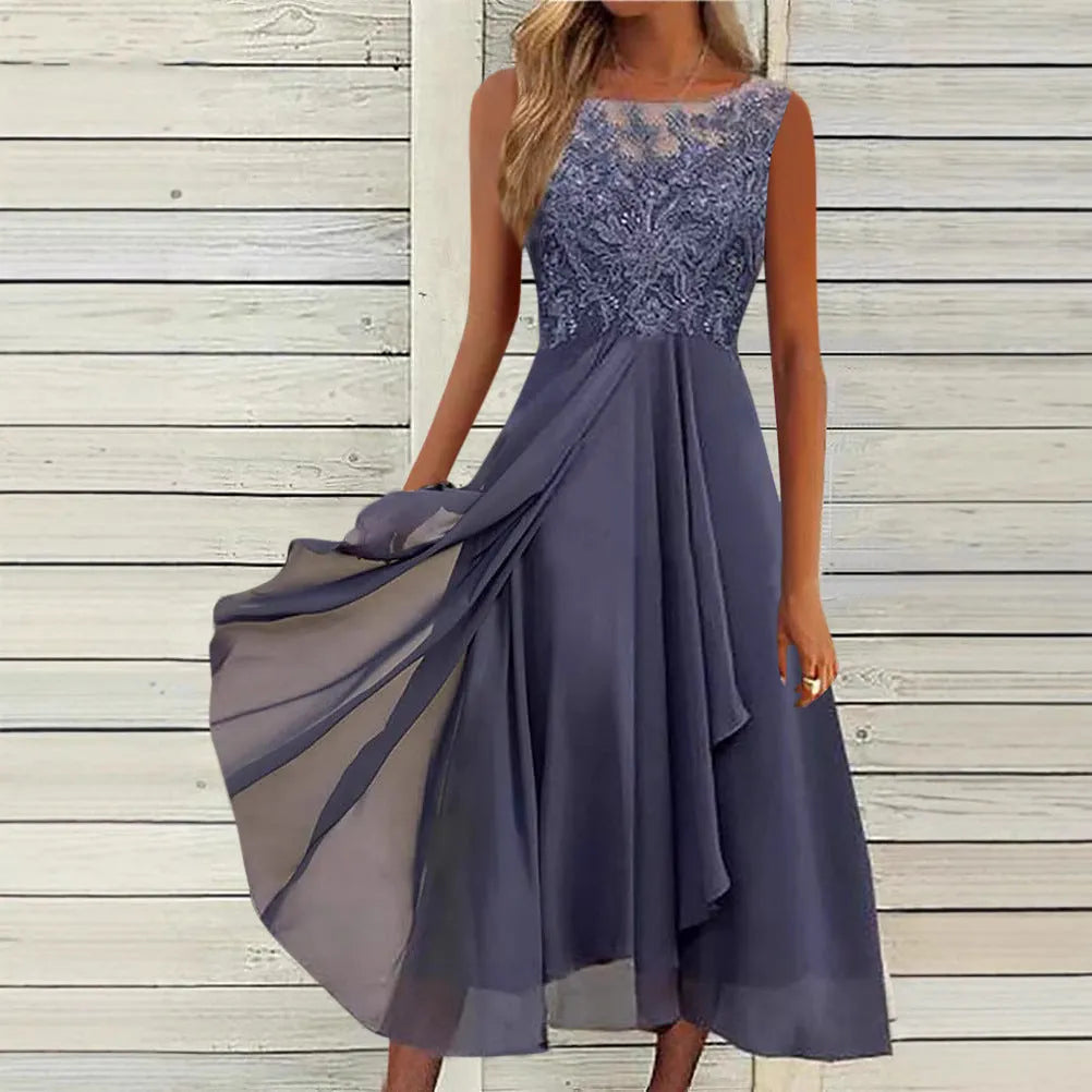Women's sleeveless green chiffon dress with white lace hollow-out detail, mid-length skirt.