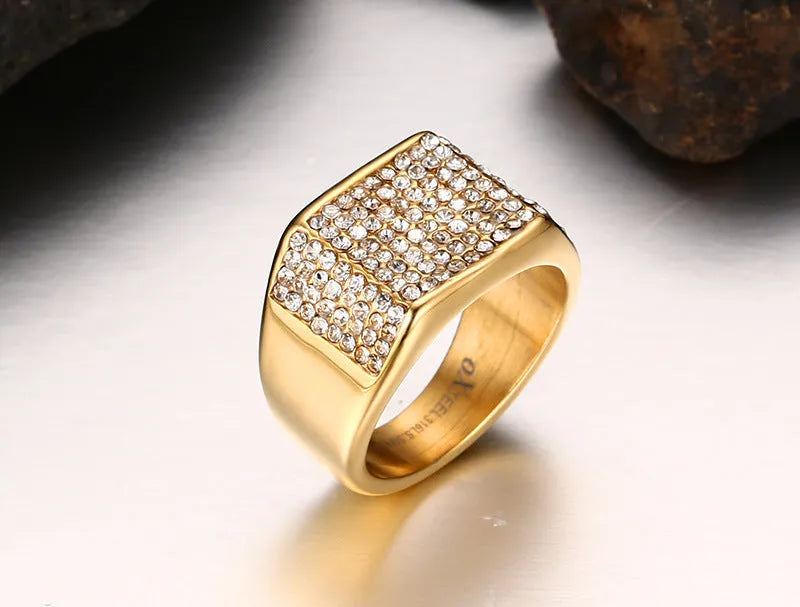 Gold titanium steel men's ring with geometric diamond-treated surface, available in sizes 7 to 12.