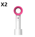 A compact portable bladeless fan with USB cable on a desk.