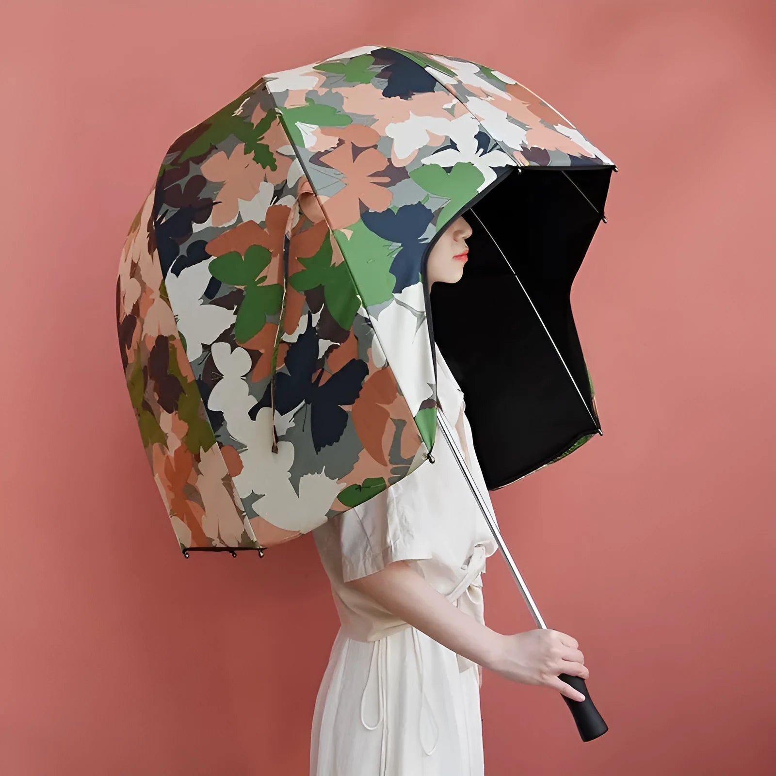 Long-handled helmet umbrella open showing 76cm diameter canopy in a vinyl-laminated fabric design.