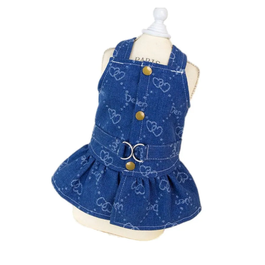 Blue denim princess dress for a small white dog, shown in brace-skirt and brace-T style variations.
