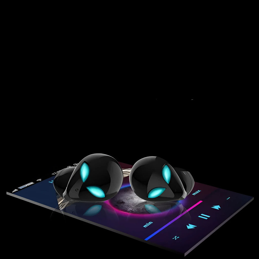 Creative Outer T8 Starman alien design Bluetooth earbuds with LED lights next to wireless charging case.