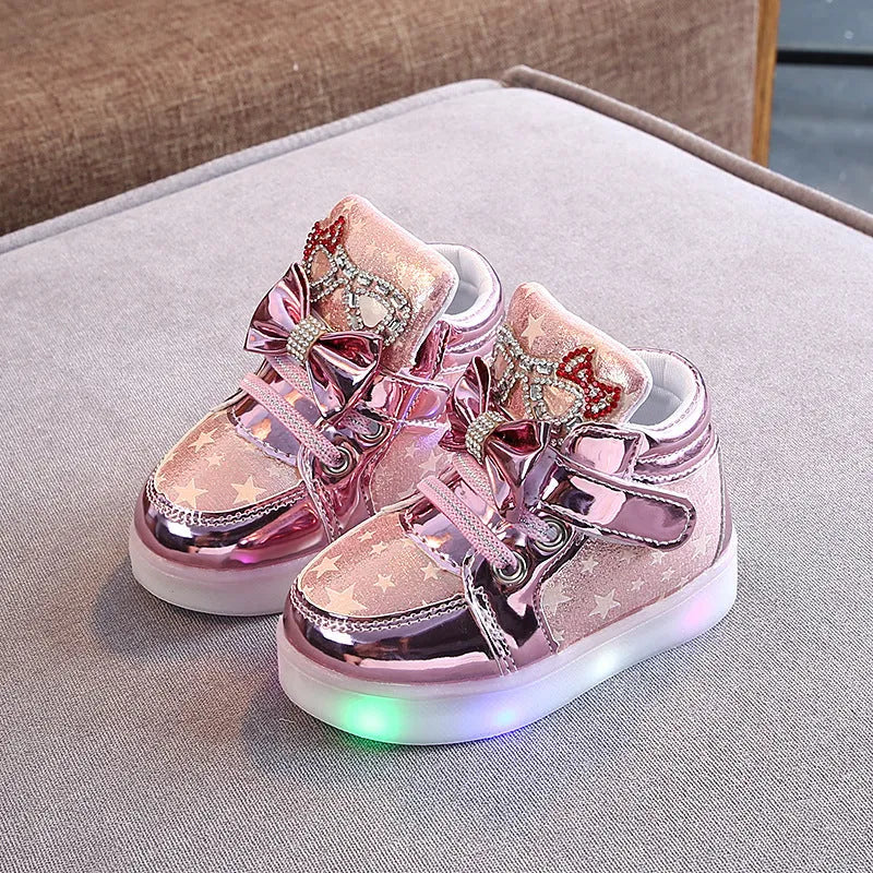 Golden, pink and silvery children's LED shoes with light-up soles, showing size chart from 21 to 30cm.