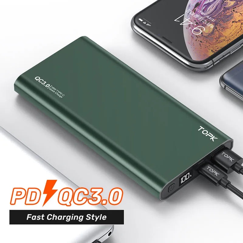 Silver 10,000 mAh fast charging power bank with digital display and metal shell on white background