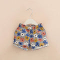 Girls casual elastic waist summer shorts in sky blue striped yellow flower pattern, size 120cm