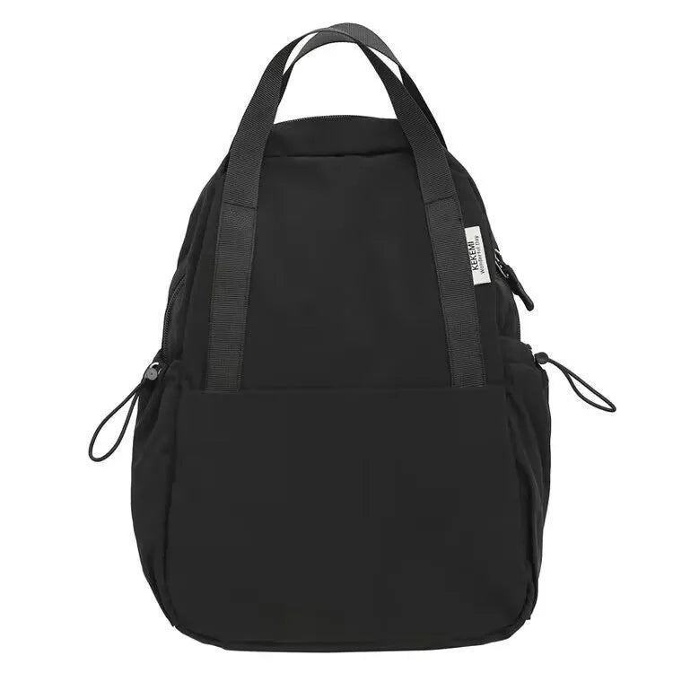 Solid colour nylon backpack in blue with curved straps and a lock, shown in a travel setting.
