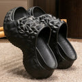 A pair of khaki high heel flip flop slippers made from injection moulded EVA with a thick sole.