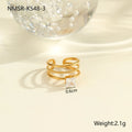Gold colour stainless steel ring with zircon stones in a geometric heart drop shape design, open mouth.